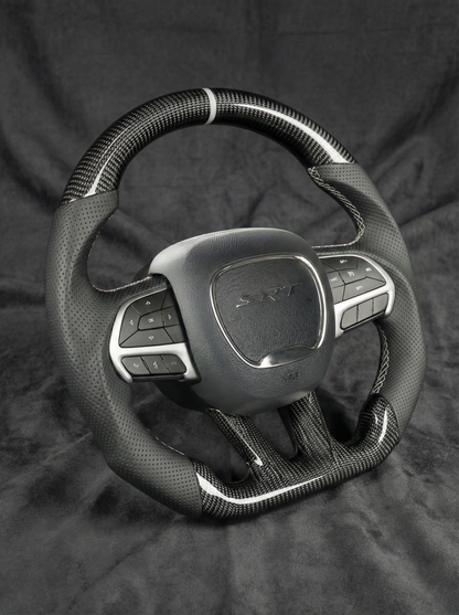 Car steering wheel with 'ST' logo on a dark background
